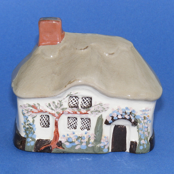 Image of the Cottage Money Box made by Mudlen End Studio